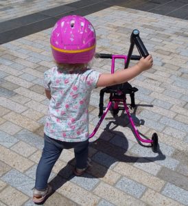 Toddler with tricycle